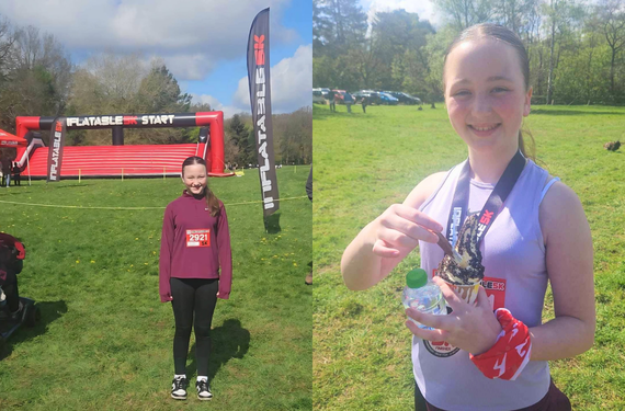A young girl at the start and end of an inflatable obstacle race